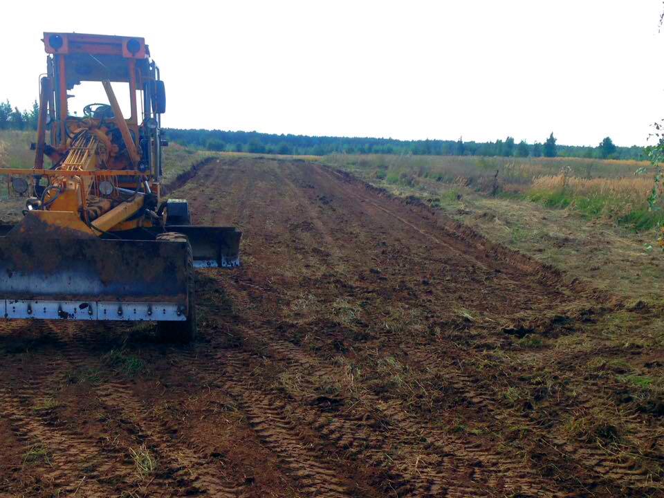 Продолжается строительство поселковых дорог в КП «Ясная поляна»