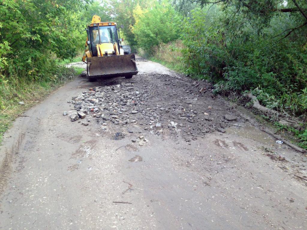 Произведен частичный ремонт подъездной дороги к КП «Ясная поляна»